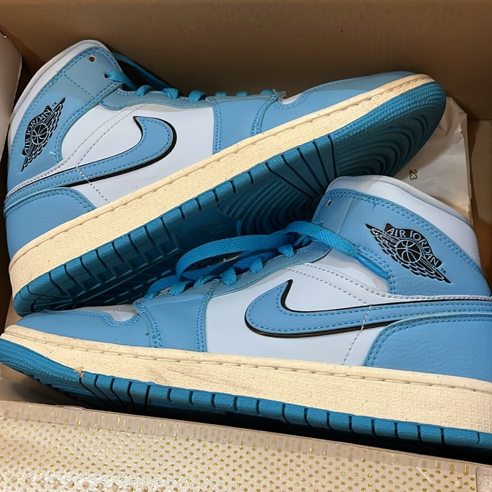 Nike Air Jordan 1 Mid Sneakers in University Blue and White